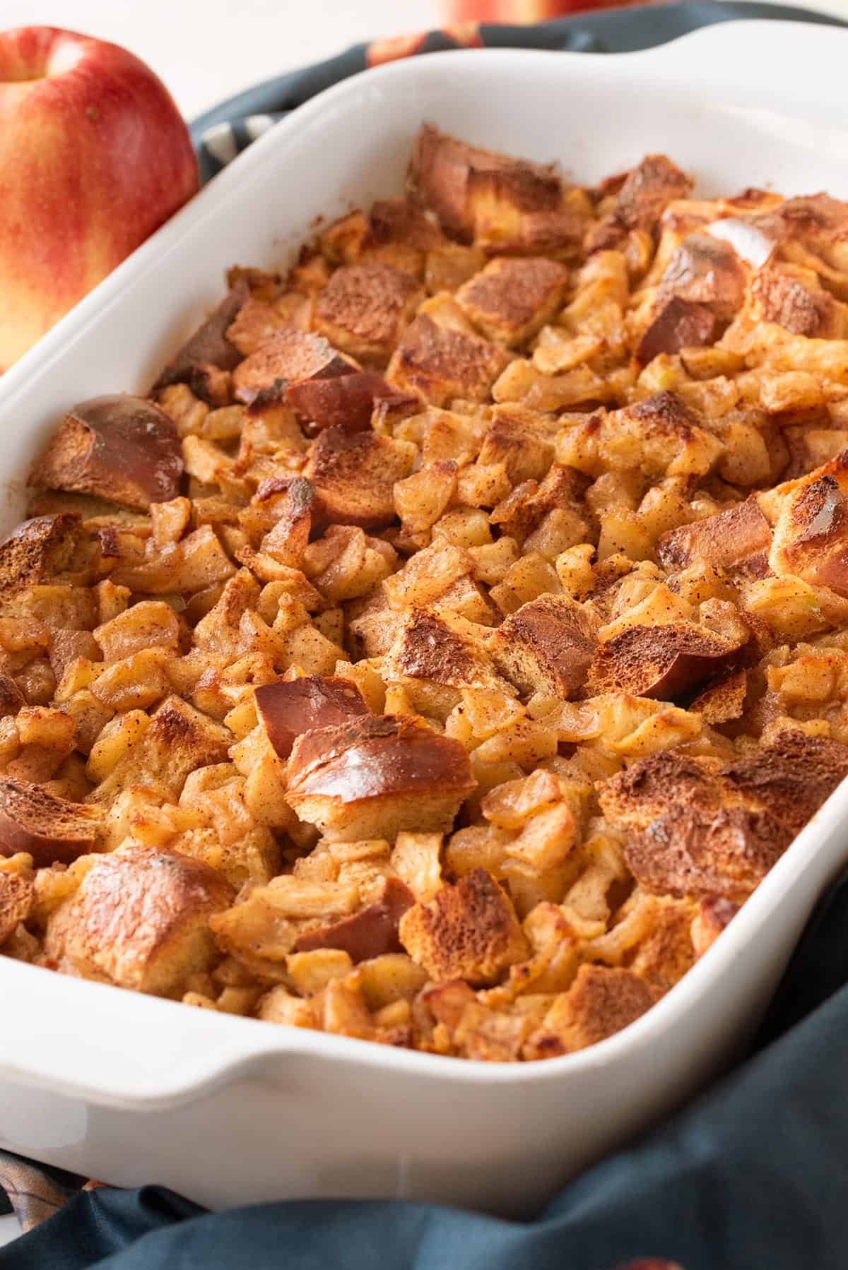 Apple bread pudding after baking in a casserole pan.