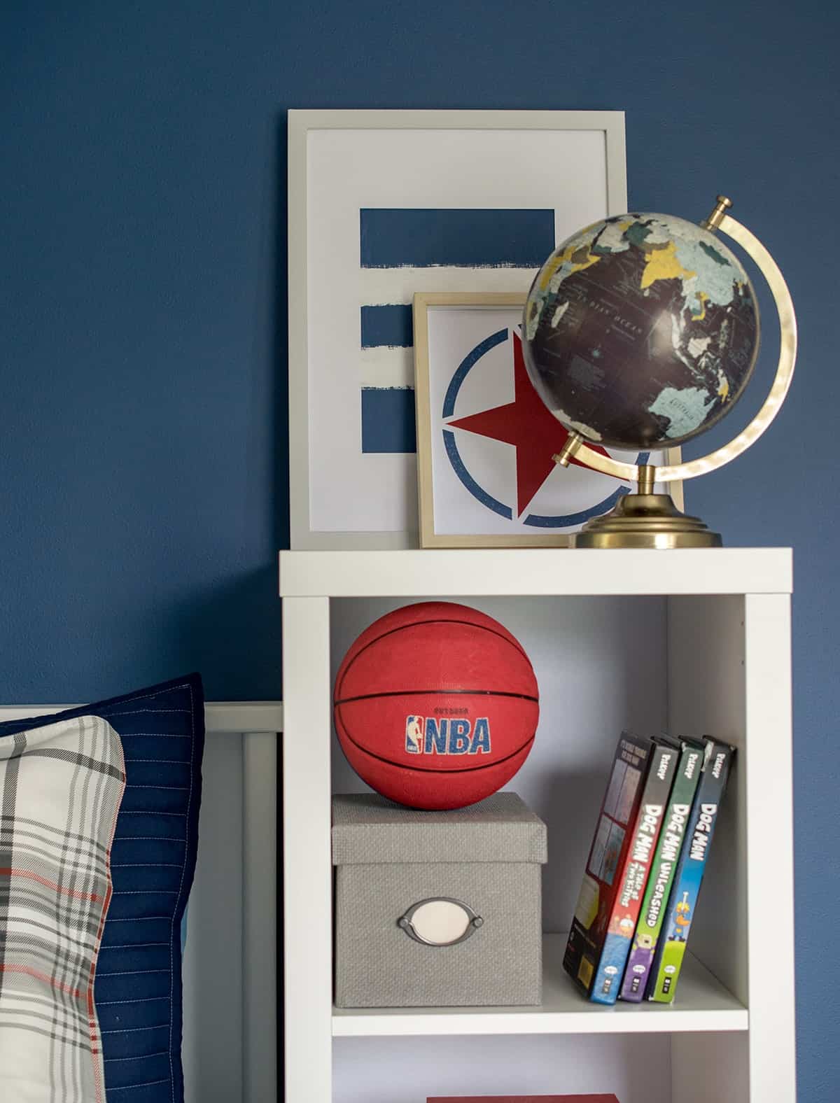 Book shelf storage idea for bedside in boys room.