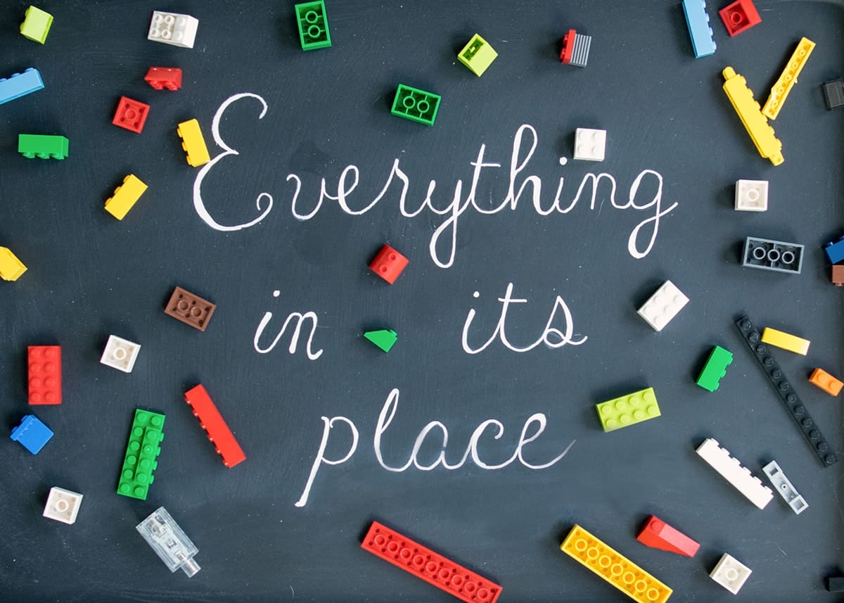 Magnetic chalkboard inside a vintage trunk that says everything in its place.