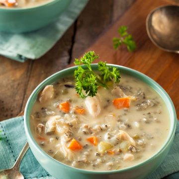 Chicken and Wild Rice Soup Recipe - This creamy soup is so delicious and flavor. It's a family favorite and great fall soup.
