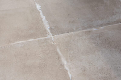 A hydrogen peroxide solution sitting in grout lines to clean.