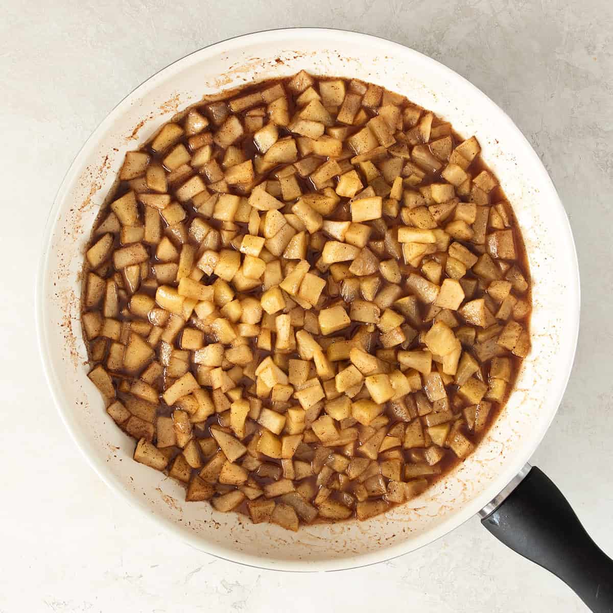 Cooked diced apples in apple pie spices.