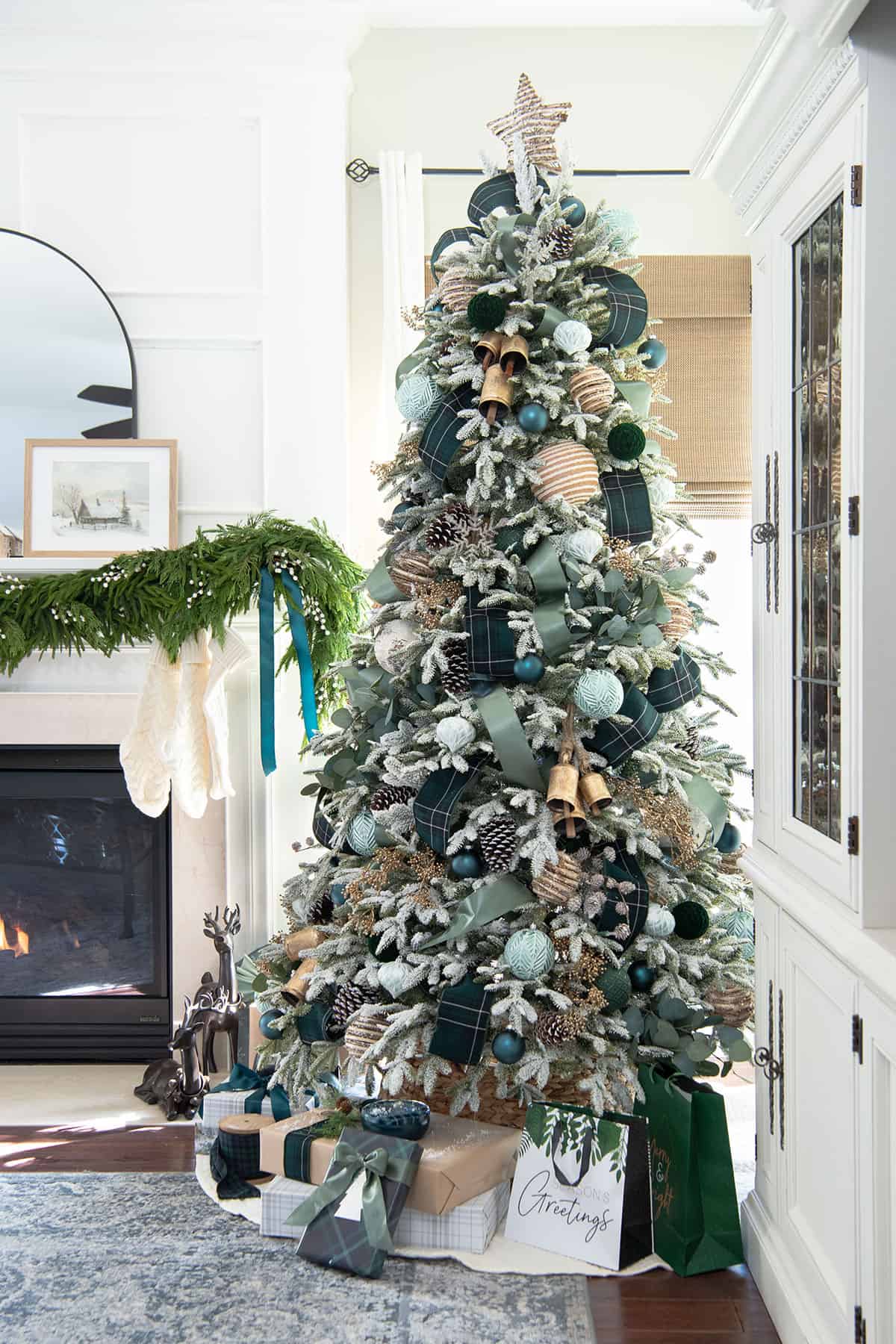 Gold and Green Christmas tree decorated color scheme in a white living room.