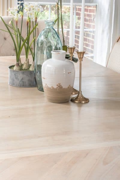 Table top with raw wood finish to show the natural grain.