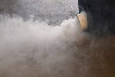 Close up of a creating low lying fog with a fog chiller.