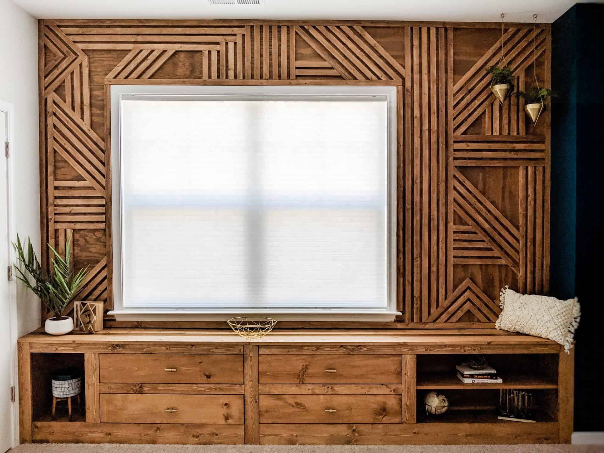 A geometric wood slat wall design with built-in bench seating.