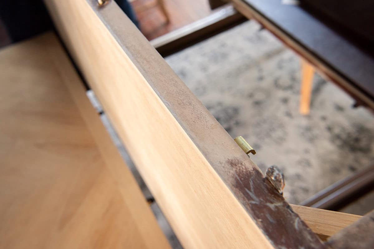 Side shot of veneer furniture table top.
