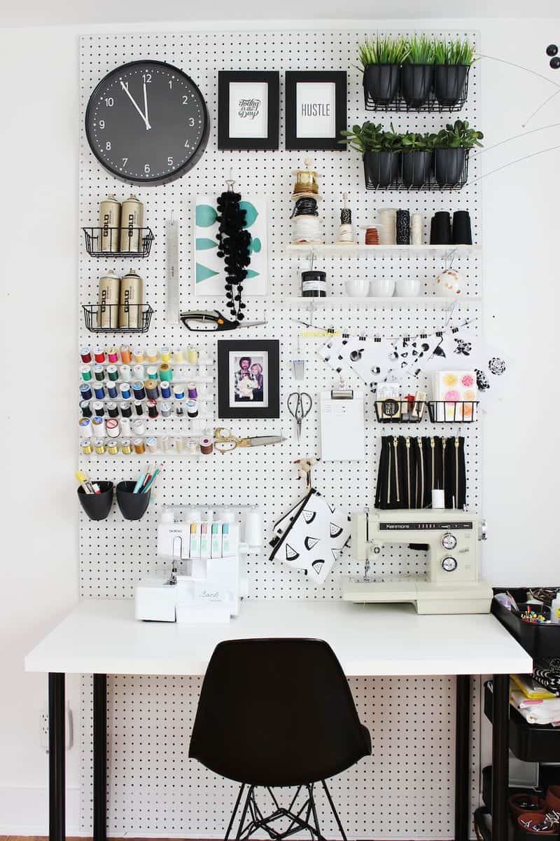 Giant pegboard storage for crafts and office supplies perfect for organizing your craft room easily and efficiently.
