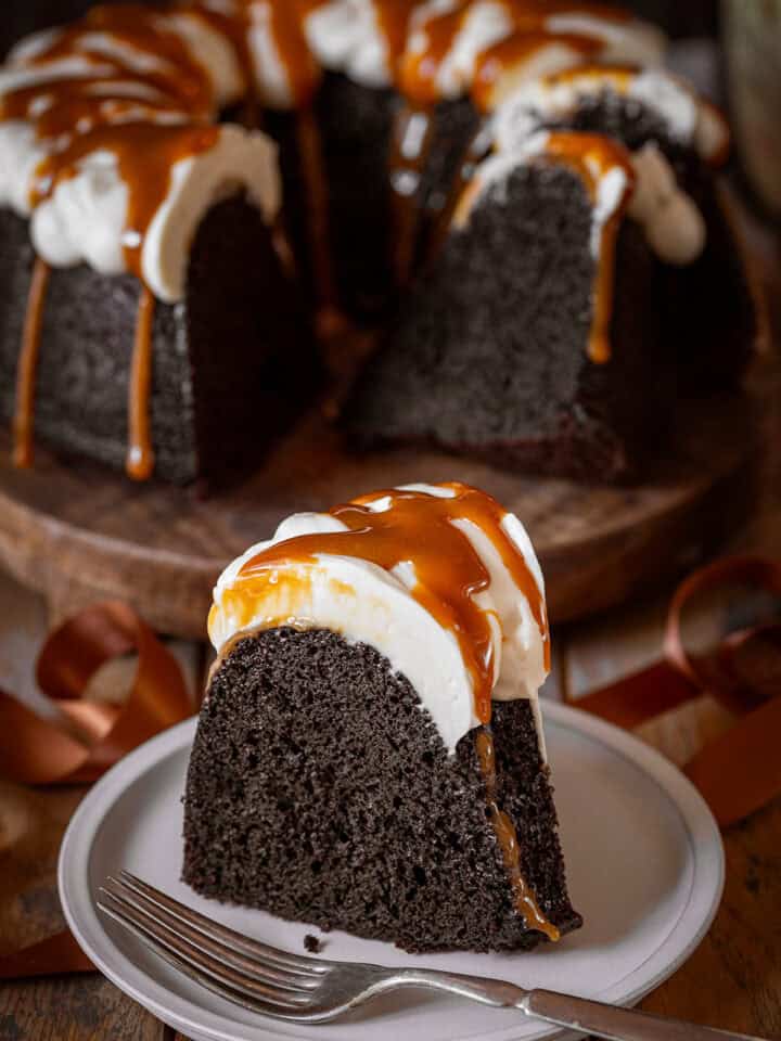 A slice of Guinness chocolate cake with white frosting to look like a pint.