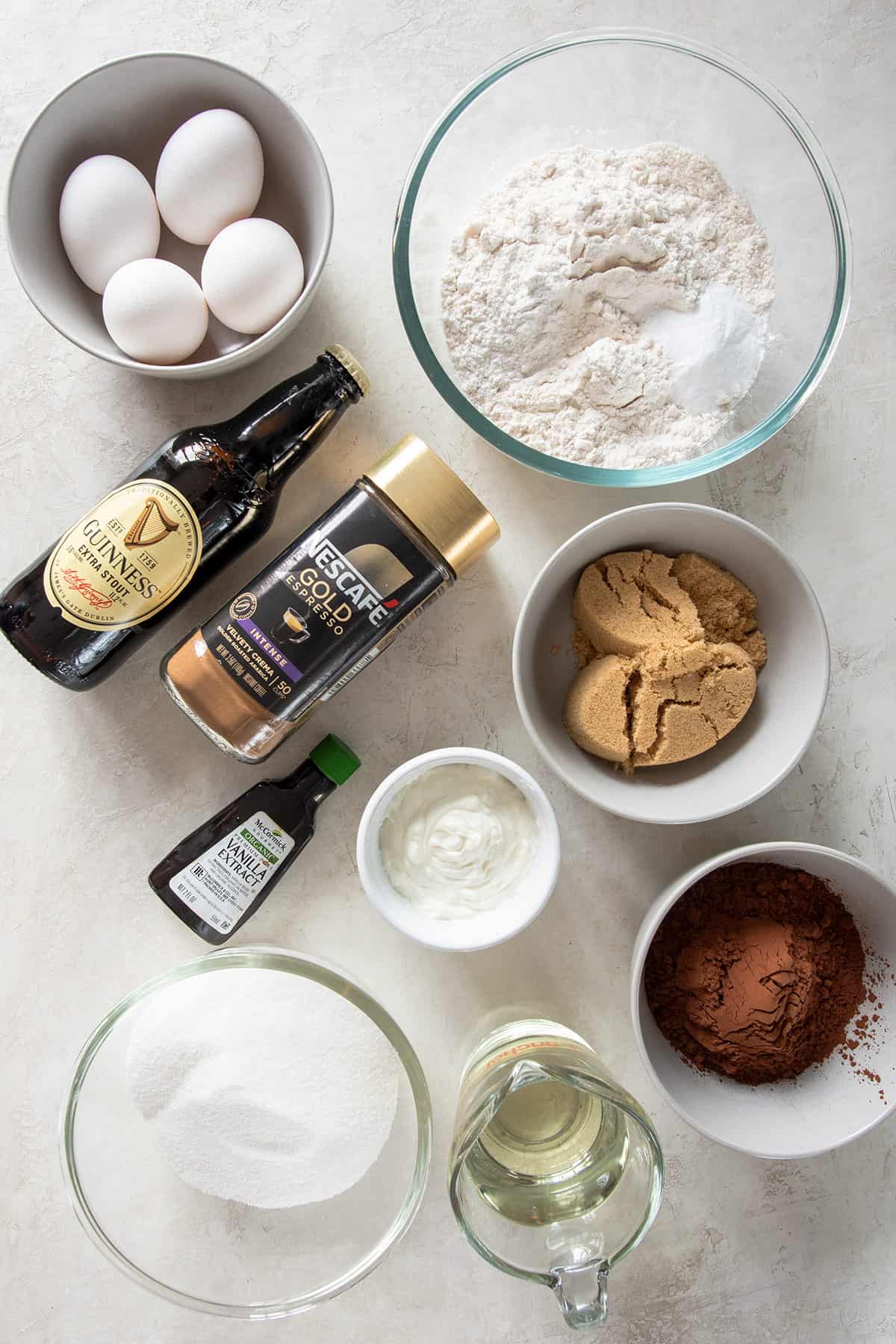 Ingredients for a cake laid out on a table.