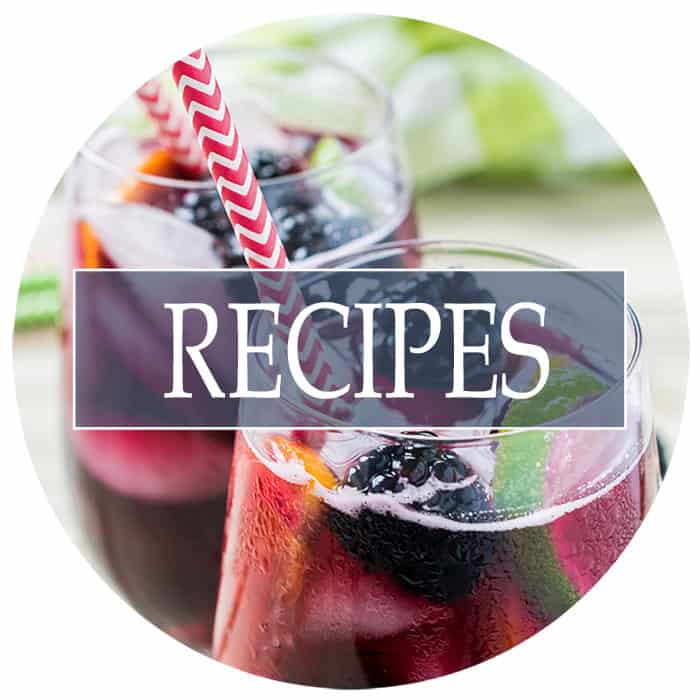 Circle of blackberry sangria in glasses overlaid with a menu title.