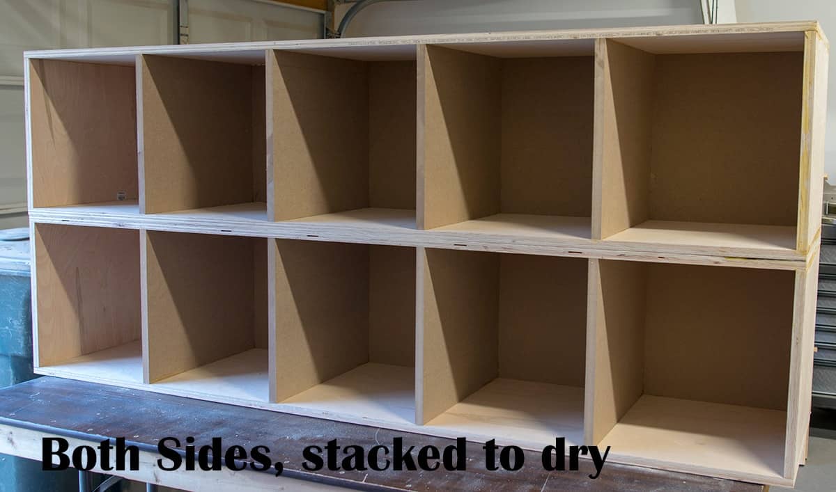 Wooden platform sides, stacked to dry.