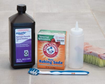 Supplies for cleaning tile grout.