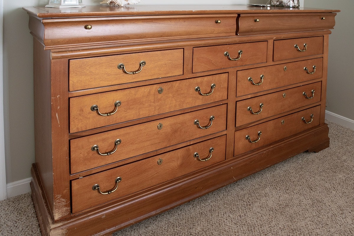 Wood dresser before DIY transformation.