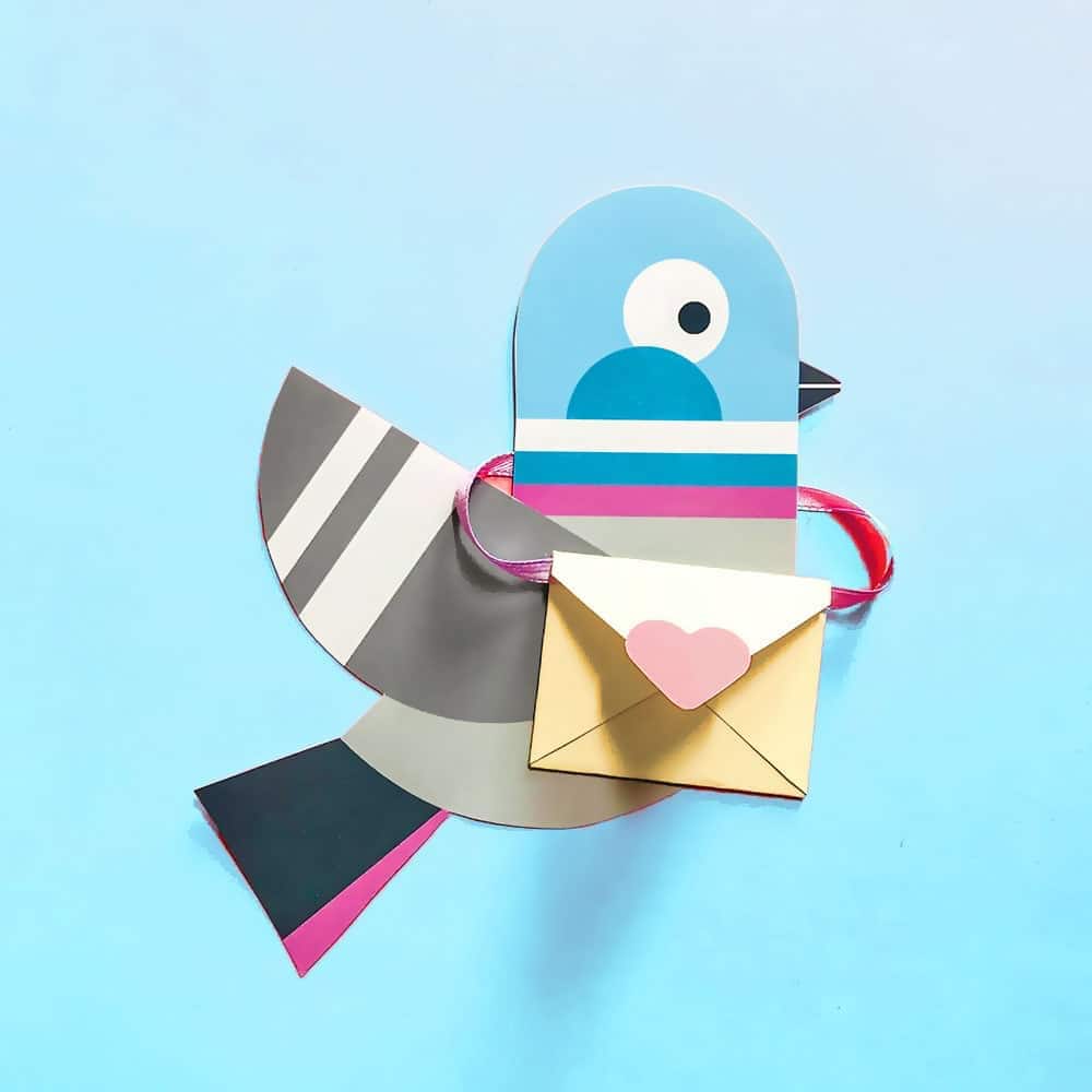 A valentine craft made out of paper to create a pigeon messenger.