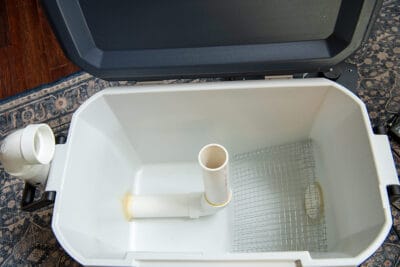 The inside of a DIY fog chiller design with pvc pipe and chicken wire.