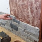 Giving a kitchen island makeover using airstone to create an artificial stone look.