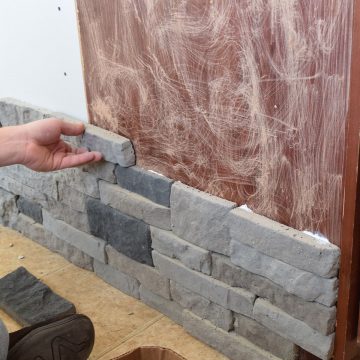 Giving a kitchen island makeover using airstone to create an artificial stone look.