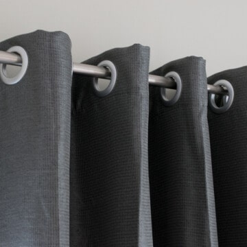 Eyelet curtain top close up.