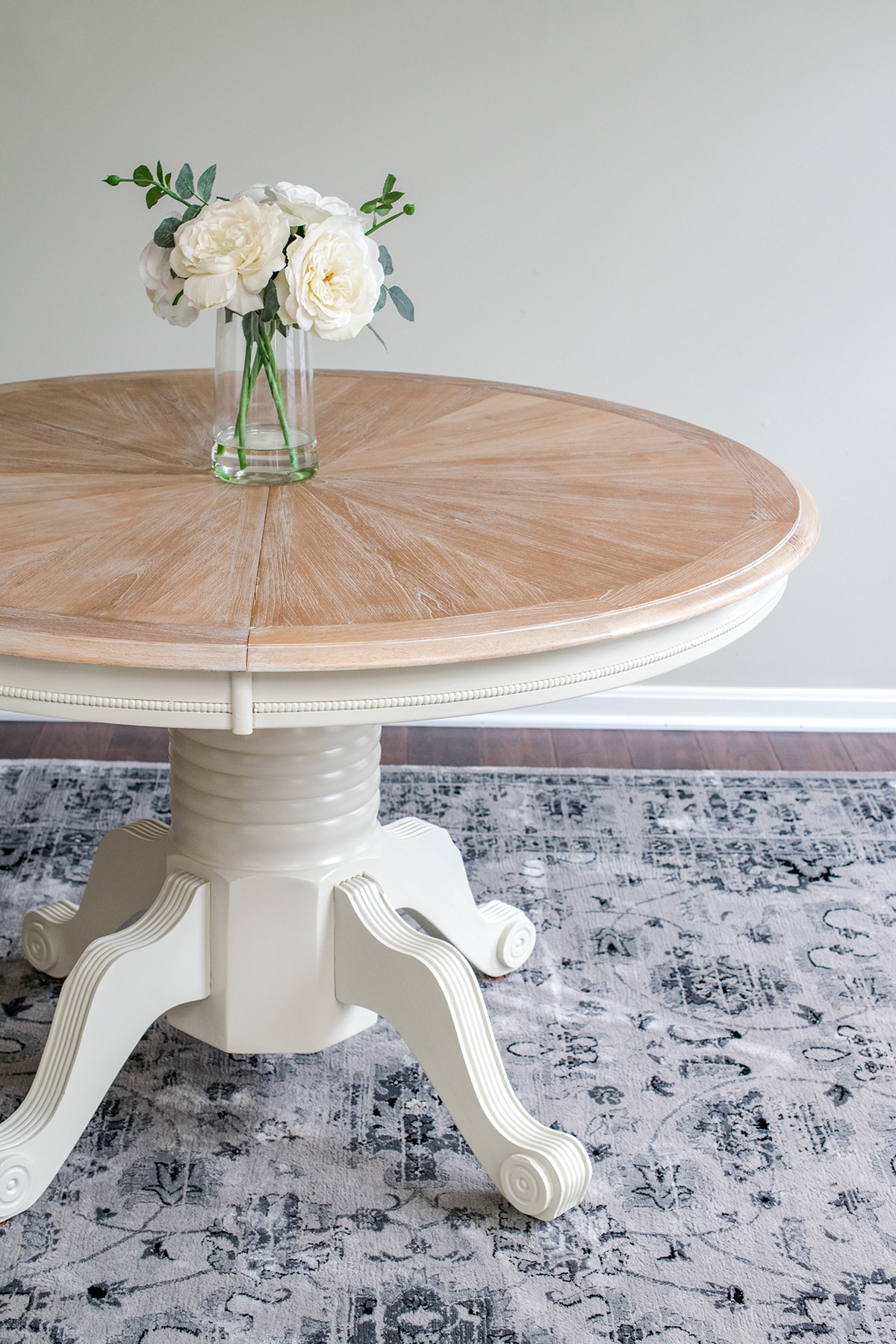 Round dining table with Benjamin Moore Stays Clear finish