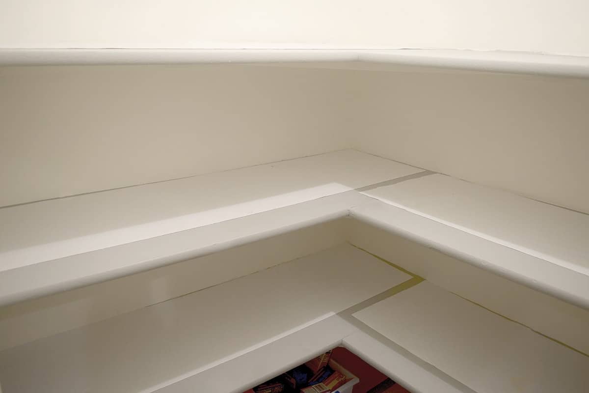 Painting and Lining Pantry shelves