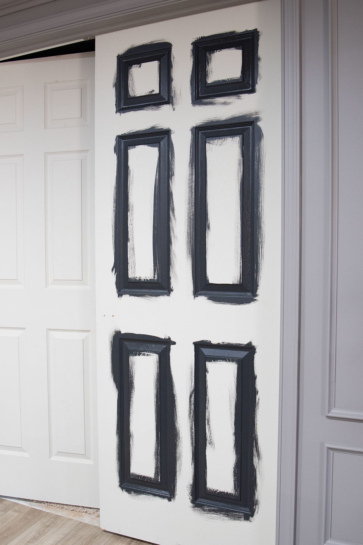 Interior doors in the process of painting black.