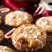 Peppermint white chocolate chip cookie with a bite taken out.