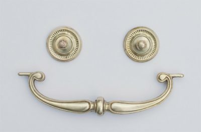 Shiny brass handles after polishing.