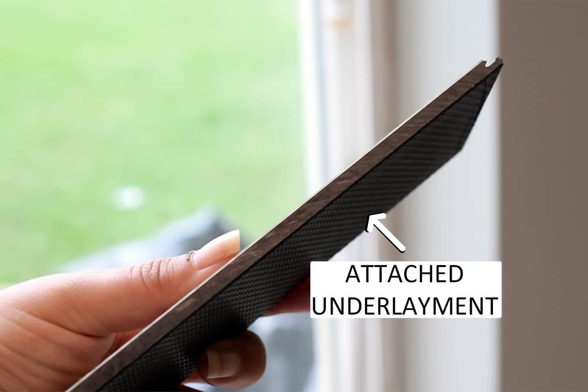 Side view of new plank with underlayment attached.