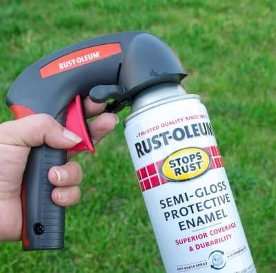 A spray paint can with a comfort grip attached.