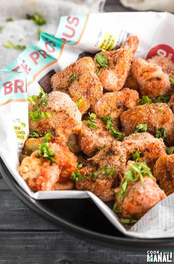 Cauliflower hot wings served in a basket.