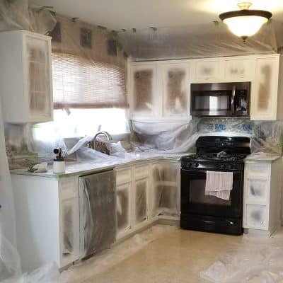 Tarp kitchen in preparation for painting.