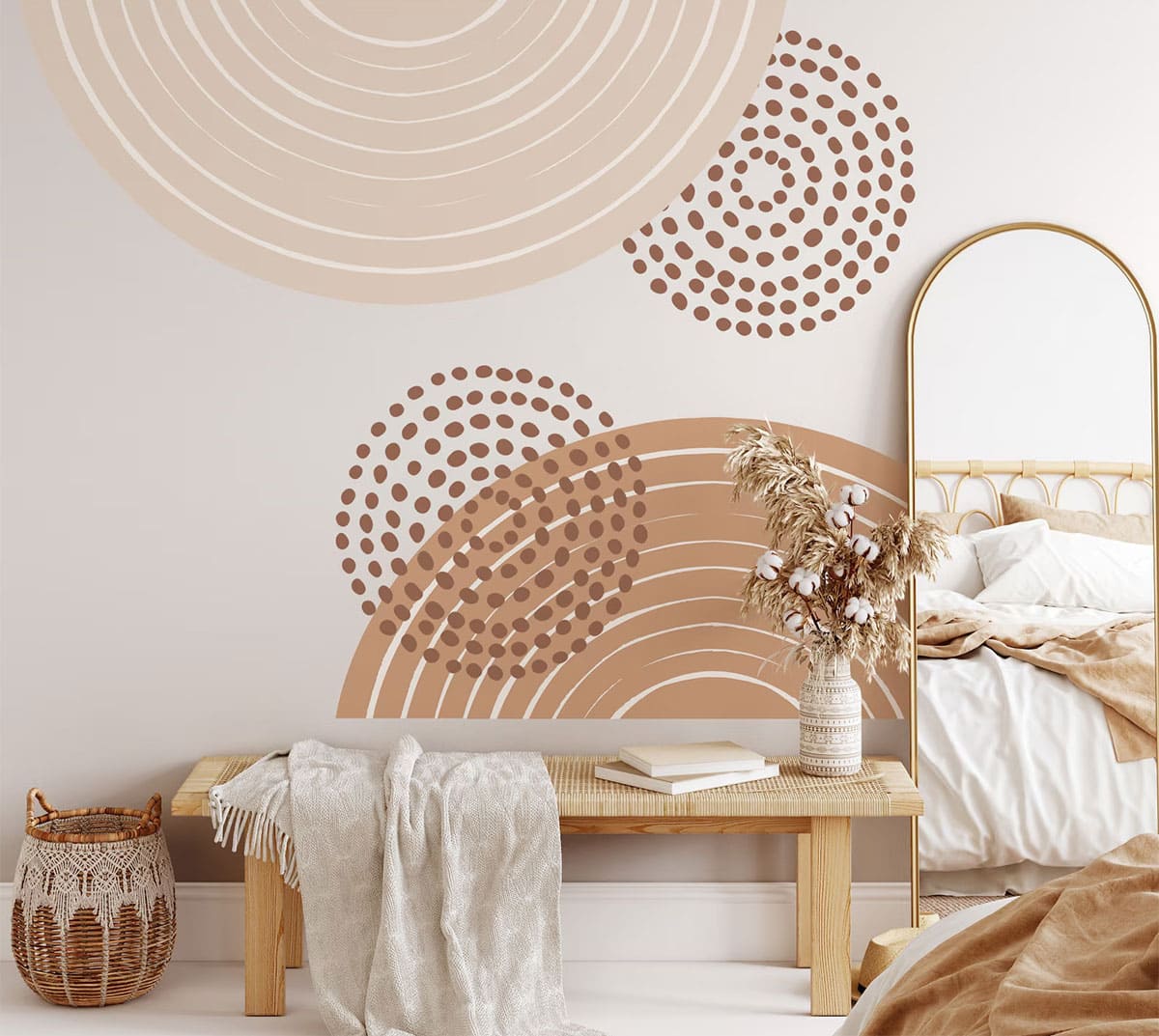 Whimsical Boho-style wall decals in circular patterns in rust-beige color scale with bench and mirror in forefront.