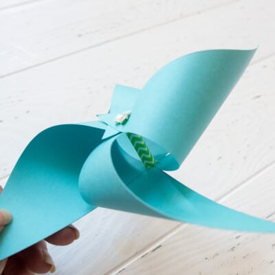 Closeup of paper windmill showing straw core.